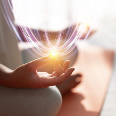 side-view-adult-meditating-with-light.jpg